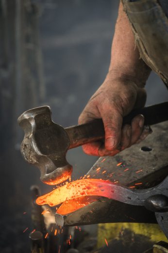 man-forging-metal-3680094